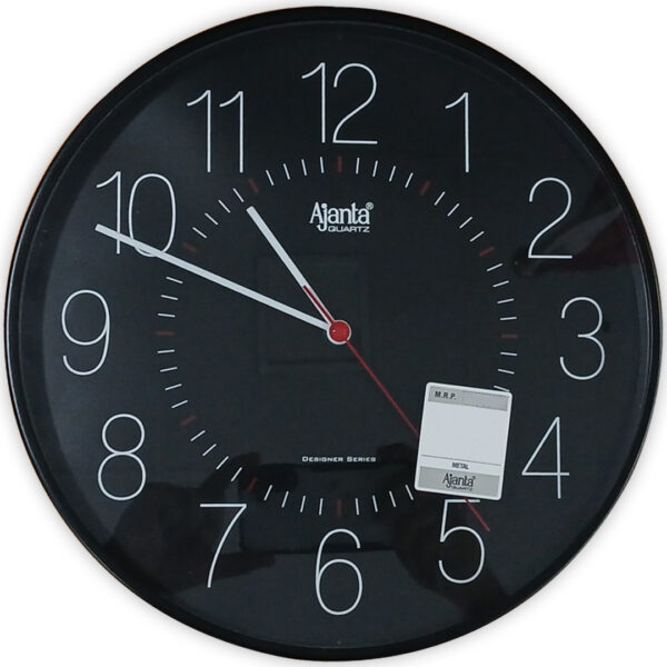 a black clock with white numbers